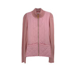 Pink quilted jacket with full-zip front, ribbed stand collar and cuffs