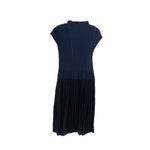 Pleated dress with short sleeves, navy top and dark skirt