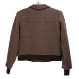 Brown herringbone jacket back view with yoke seam and ribbed cuffs and hem