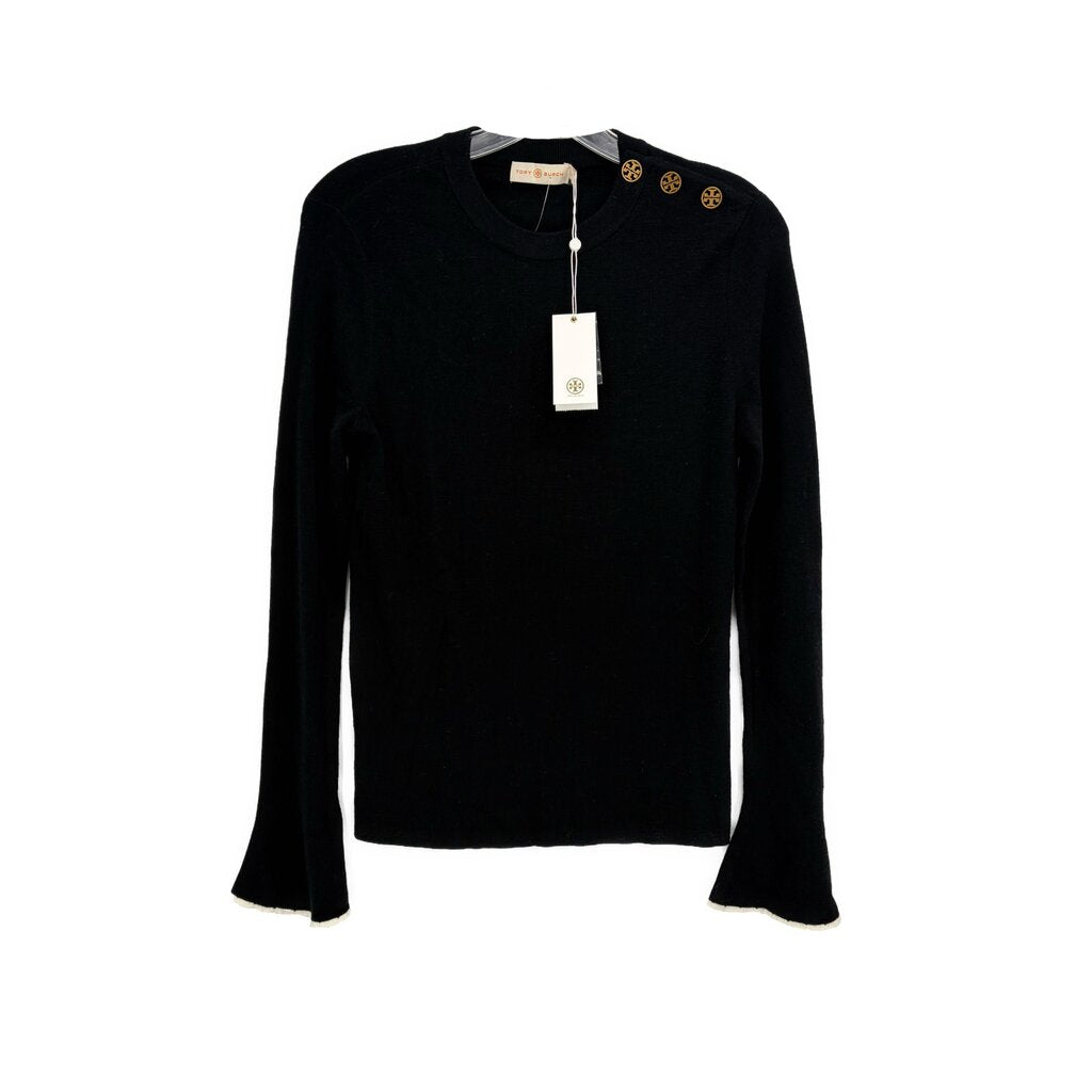 Black bell-sleeve sweater with crew neck and small gold emblem at neckline