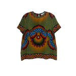 Printed top in green with multicolor folk-style central design and short sleeves