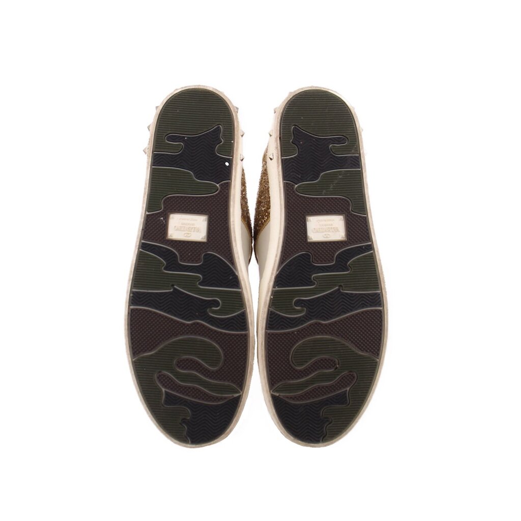 Glitter sneaker outsoles with textured rubber tread