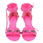 Balenciaga Cagole pink heeled sandals shown from front with ankle zipper and straps