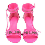Balenciaga Cagole pink heeled sandals shown from front with ankle zipper and straps