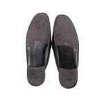 Black leather slide loafer outsole and heel, pair view