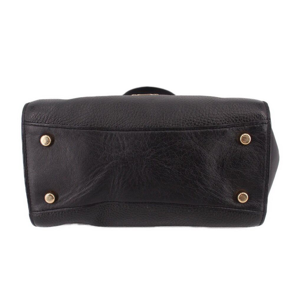 COACH Blake flap carryall tote back view in black leather with metal feet