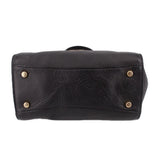 COACH Blake flap carryall tote back view in black leather with metal feet