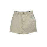 Cream denim mini skirt with button fly, front pockets, and belt loops
