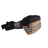 BURBERRY belt bag with adjustable strap, black buckle, and tan check front panel