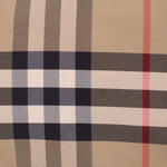 BURBERRY check fabric panel texture in tan, navy, red, and white