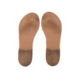 Pink insoles with brand text on heel and smooth suede-like footbeds