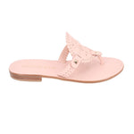 Pink thong sandals, side view, with decorative floral stitching and low heel