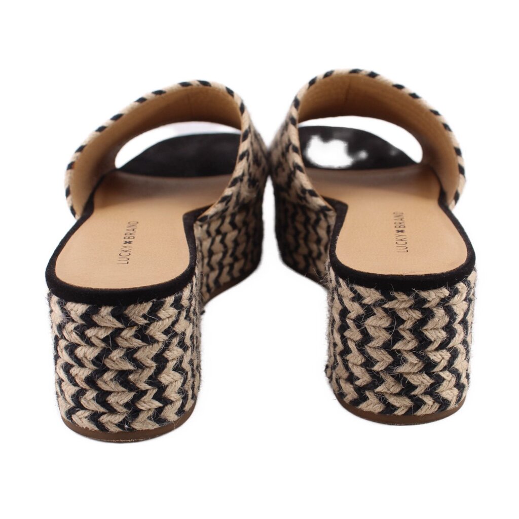 Back view of woven espadrille platform slide sandals with cream-and-black zigzag wedge