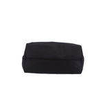 Black tote bag with flat folded top and smooth structured base