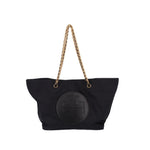 Black chain tote with gold-tone handles and circular embossed logo patch