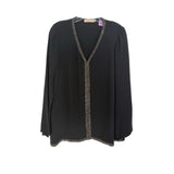 Black long sleeve top with V-neck and rhinestone-look trim along center and hem