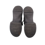 Sneaker outsoles, dark rubber tread with brand logo marks