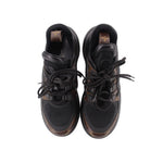 Pair of Archlight sneakers front view, black mesh with tan monogram toe accents