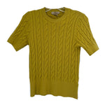 Green short-sleeve knit sweater with crew neck and cable knit texture