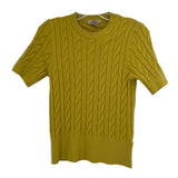Green short-sleeve knit sweater with crew neck and cable knit texture