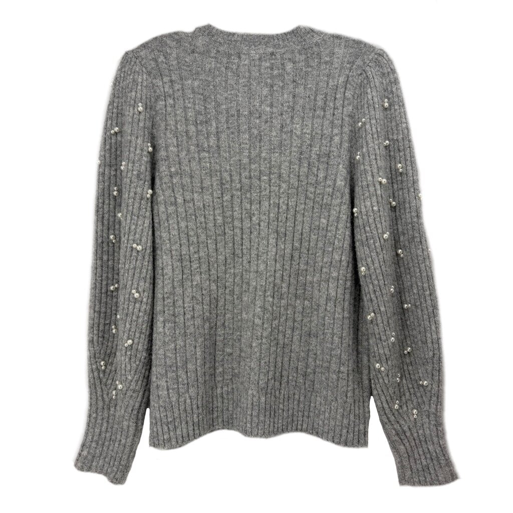 Back of the gray ribbed sweater, with pearl accents along the sleeves