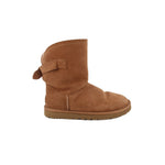 Chestnut suede ankle boots with strap detail and low-profile rubber outsole