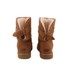 Chestnut suede boots with shearling lining, side strap, and UGG heel label