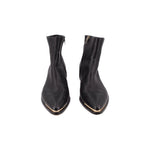 Pair of black leather ankle booties with pointed toe and block heel