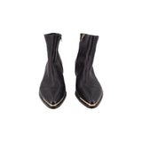 Pair of black leather ankle booties with pointed toe and block heel
