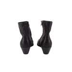 Black leather ankle booties rear view with block heel