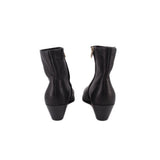 Black leather ankle booties rear view with block heel