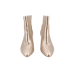 Pair of metallic gold ankle booties, front view, pointed toe