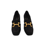 Pair of black suede loafer heels with gold-tone bit bar detail