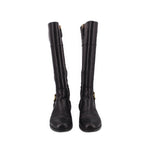 Black knee-high leather boots, pair view with gold buckle accents