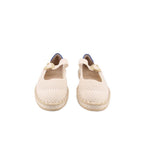 Mary Jane flats with cream woven knit upper and gold buckle strap, front view