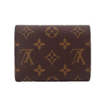 Louis Vuitton Victorine monogram wallet front flap with all-over gold logo pattern