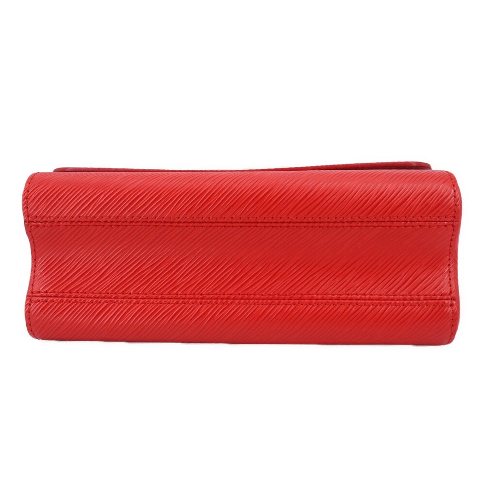 Red crossbody bag bottom view with structured top flap