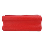 Red crossbody bag bottom view with structured top flap