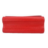 Red crossbody bag bottom view with structured top flap