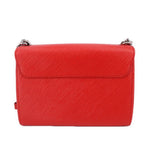 Twist MM crossbody bag in red textured leather with top flap