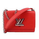 Twist MM crossbody bag in red textured leather with LV emblem and chain strap