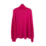 Pink crochet-knit sweater, high ribbed turtleneck and openwork knit sleeves