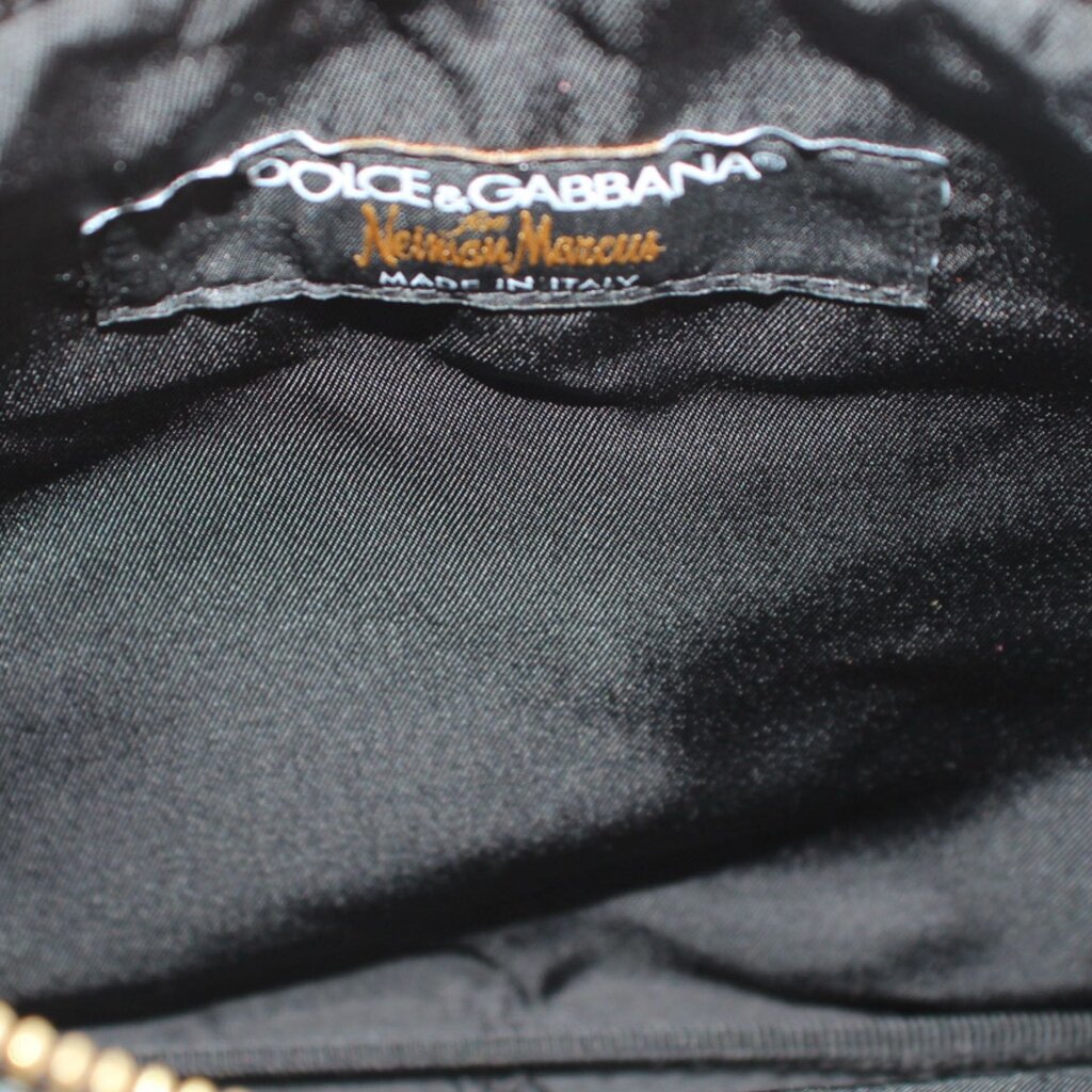 Dolce & Gabbana pouch interior fabric label with 'Made in Italy' text