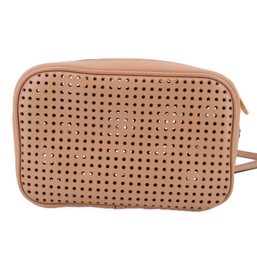 Tan perforated crossbody bag front panel with zip closure and gold zipper pull