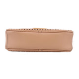 Tan perforated crossbody bag back view, smooth panel with strap attachment
