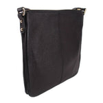 KATE SPADE AUBURN PLACE Cordelia black crossbody bag, side profile and metal eyelets.