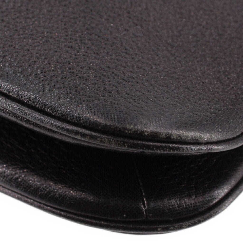 KATE SPADE AUBURN PLACE Cordelia black crossbody bag edge close-up with stitched trim.
