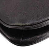 KATE SPADE AUBURN PLACE Cordelia black crossbody bag corner close-up with curved seam.
