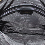 KATE SPADE AUBURN PLACE Cordelia black crossbody bag interior lining with printed text.