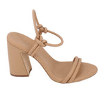 Nude leather heeled sandals with crisscross strap and block heel, open toe